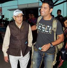 Mahendra Singh Dhoni with his father