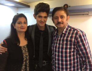 Rohan Mehra with his parents