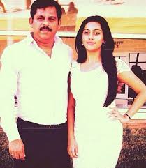 Anu Emmanuel with her father