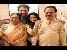 Dev with his family