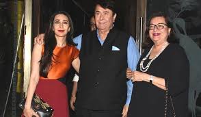 Karisma Kapoor with her parents