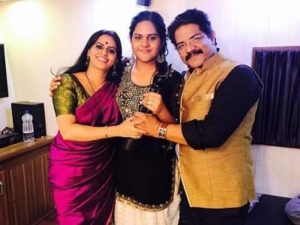 Meghna Mishra with her parents