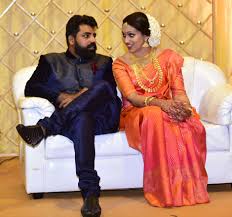 Parvathy with her husband