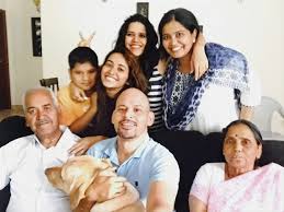 Asha Negi with her family