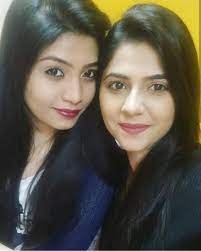 Veena Jagtap with her sister