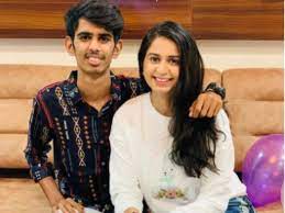 Kinjal Dave with her brother