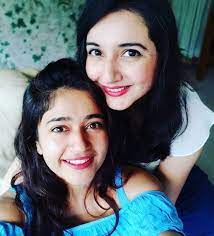 Poonam Bajwa with her sister