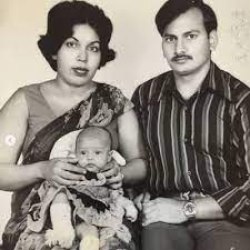 Flora Saini with her parents