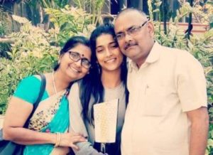 Vartika Jha with parents