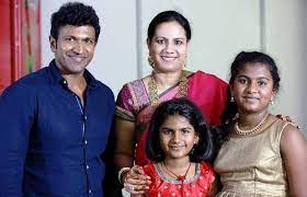 Puneeth Rajkumar with his wife & daughters